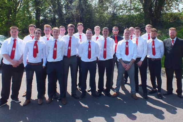 The Rovers squad in their club ties.