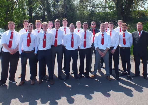 The Rovers squad in their club ties.