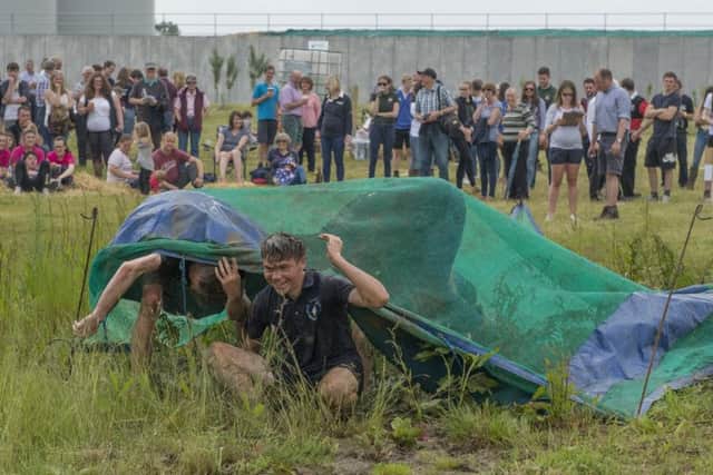 Teams take part in an obstacle course at the rally. Picture: Sarah Washbourn www.yellowbellyphotos.com NNN-180206-194838002