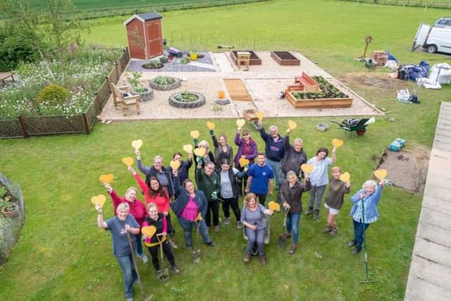 Lincolnshire Co-op volunteers have been working on a new garden for patients and their families at St Barnabas Hospice in Louth.