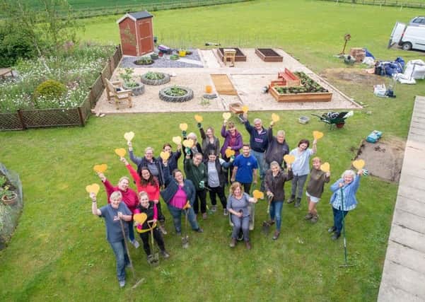 Lincolnshire Co-op volunteers have been working on a new garden for patients and their families at St Barnabas Hospice in Louth.