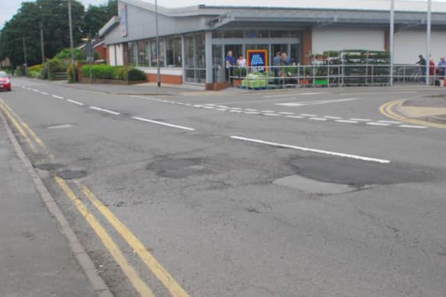 At last! Potholes on Mareham Lane in Sleaford have finally been filled in by council highways engineers after months of complaints. EMN-180806-134448001