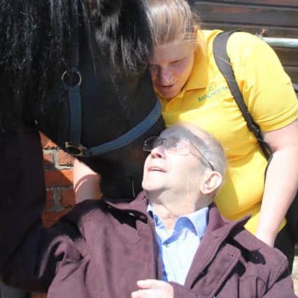 Newton House carerJodie with one of the residents during their visit to Kesteven Rideability. Photos by Danielle Rain.