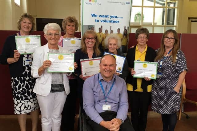Pictured (back, from left) Jayne Stringer, of Stickney, Anne Allan, of Boston, Pat Hiley, of Wrangle, Lori Slater, of Boston, Eileen Daubney, of Boston, Dinah Emmitt, of Sutterton, Jennie Negus, and ULHT deputy chief nurse, and (front) Andrew Tysoe, ULHT voluntary services manager.