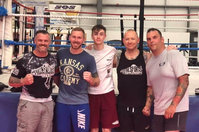 Titich Marshall, local kickboxing champion Phil Robbins, Taylor Sellars, Lea Addlesee and Dean Barnshaw in training for the charity fight night. EMN-180619-095025001