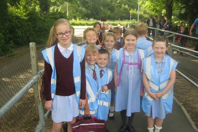 William Alvey children using the Walking Bus. EMN-180618-215713001