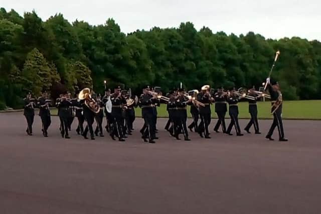 The Band of the RAF College Cranwell perform for guests at the Sunset ceremony for the Queen's birthday reception.