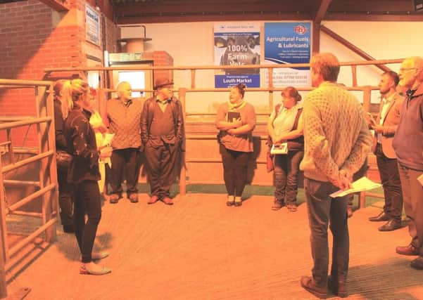 A group taking a tour around the Louth Cattle Market site during the public consultation evening on Tuesday June 12.