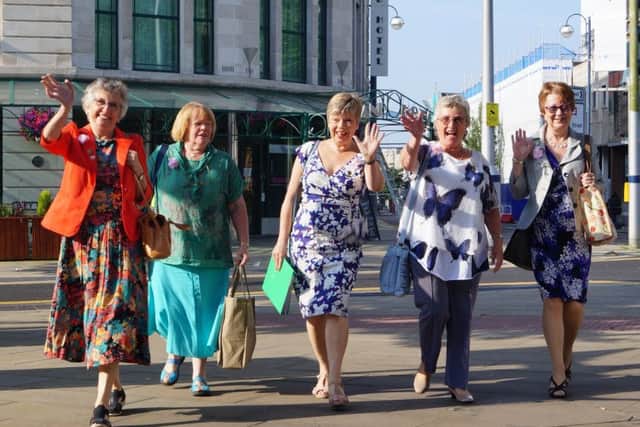 Happy trippers in the Welsh sunshine