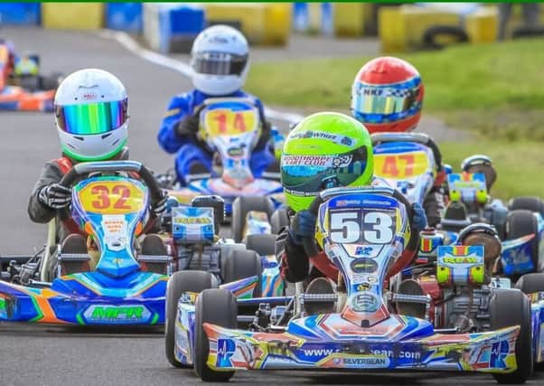 The eight to 11-year-olds do battle in the Honda Cadets class EMN-180618-125139002