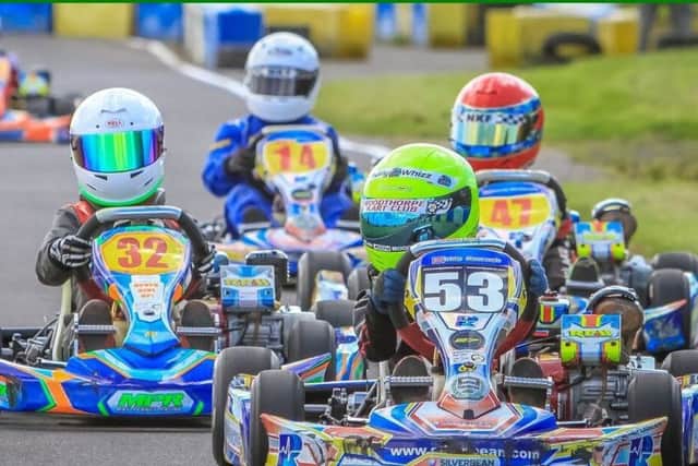 The eight to 11-year-olds do battle in the Honda Cadets class EMN-180618-125139002