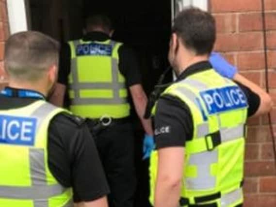 Police during one of the raids in Skegness