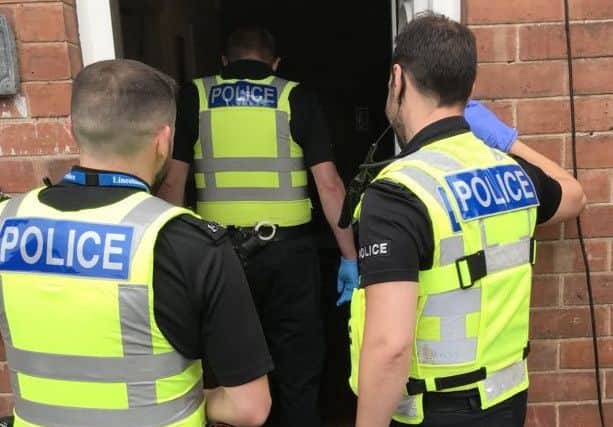 A police drugs raid.