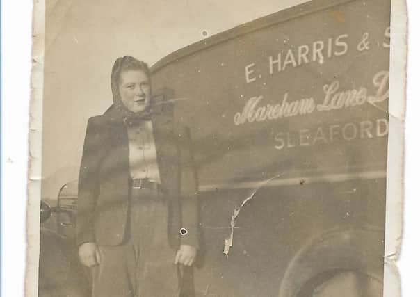 Doris Eaton (nee Harris) with a vehicle from the family business. EMN-180619-132847001