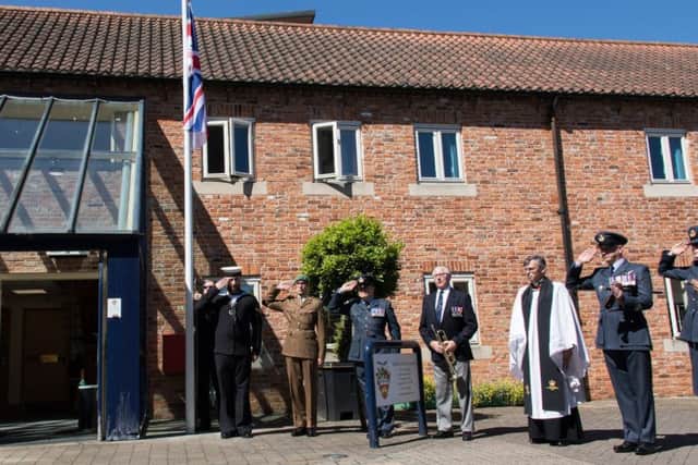Sleaford marked the start of Armed Forces Week 2018 with a flag raising ceremony in front of Sleaford Town Hall.Photo Laurence Platfoot EMN-180625-180811001