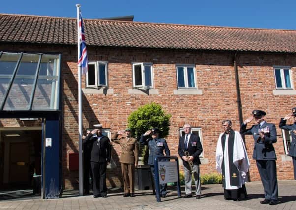 Sleaford marked the start of Armed Forces Week 2018 with a flag raising ceremony in front of Sleaford Town Hall.
Photo Laurence Platfoot EMN-180625-180811001