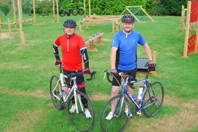 Aiming to cover 130 miles on bikes for Our Lady of Good Counsel School, from left - Nick Spolton and Kevin Skeith. EMN-180625-135510001