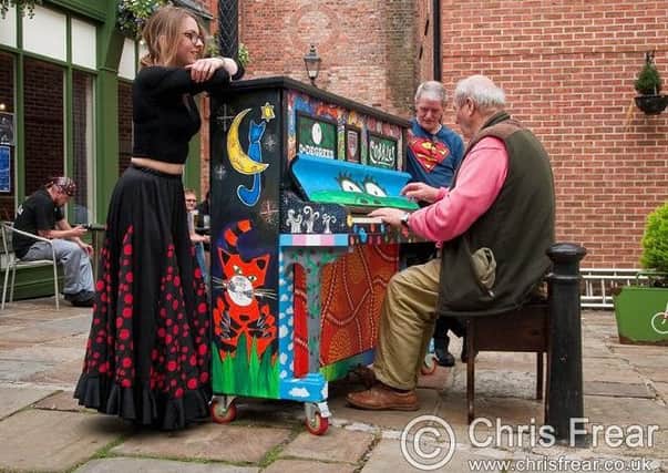 The piano outside Cobbles Bar in New Street, Louth. (Photo: Chris Frear).