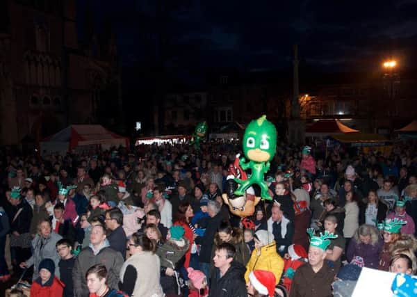 Lights switch on at Sleaford Christmas Market. EMN-180621-111356001