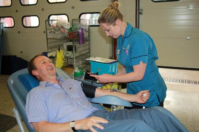 Coun Nick Worth at a trial blood donation session at Boston Fire Station.