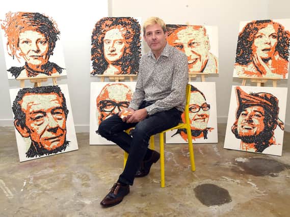 Artist Ed Chapman with some of his top 10 East Midlander portraits, including Jennifer Saunders - born in Sleaford.