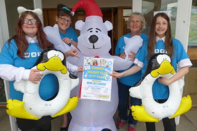 Estelle Forsythe and some of the Polar Explorers Holiday Club volunteers getting ready for August