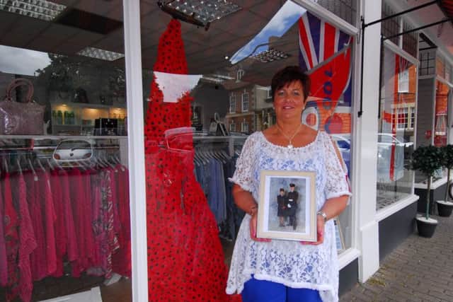 Wendy Hanslip and her Armed Forces Week shop window at Bellissimo Boutique in Sleaford. EMN-180625-135556001