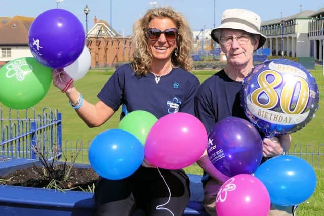 Charity walkers Frank Fisher, (80), and Scheme Manager Debbie Prince, prepare for their fundraising half-marathon walk.