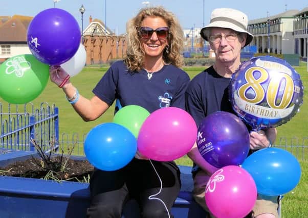 Charity walkers Frank Fisher, (80), and Scheme Manager Debbie Prince, prepare for their fundraising half-marathon walk.