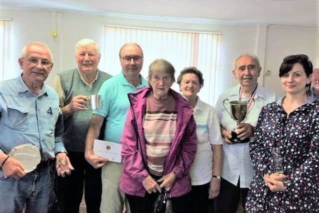 Best in Show winner Isabel Hildred, centre, with, from the left, Brian Jepson (on behalf of Lou Ashurst), John Jaques, John Mabbett, Sheila Brislin, John Bennett and Gayle Smith. EMN-180207-091936001