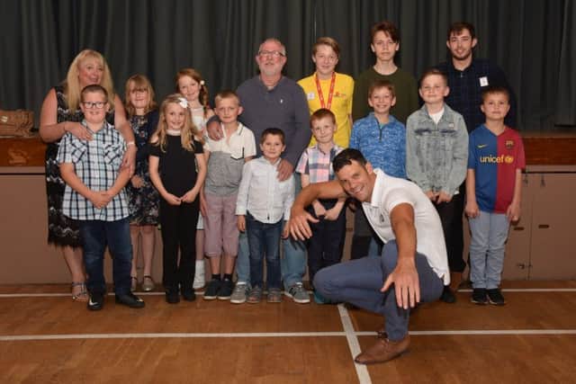 Some of the different stage winners pictured with Adam Walker who gave an illustrated talk on endurance swimming and presented the awards. EMN-180207-143044001
