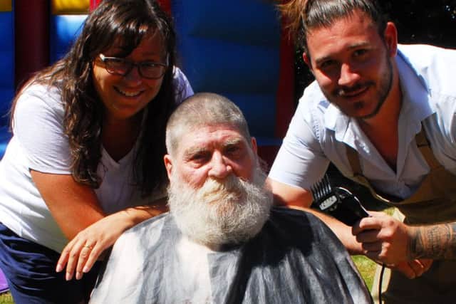 Before the cut. Ashdene care home manager Jilly Hunt, barber James Chater and Roy Smith. EMN-180207-224757001