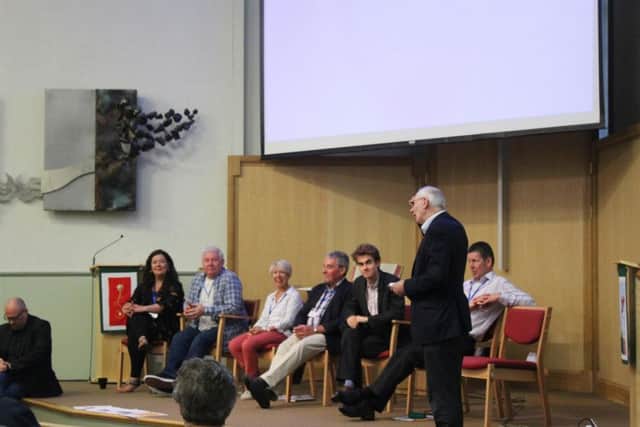 The panel of speakers at the event.