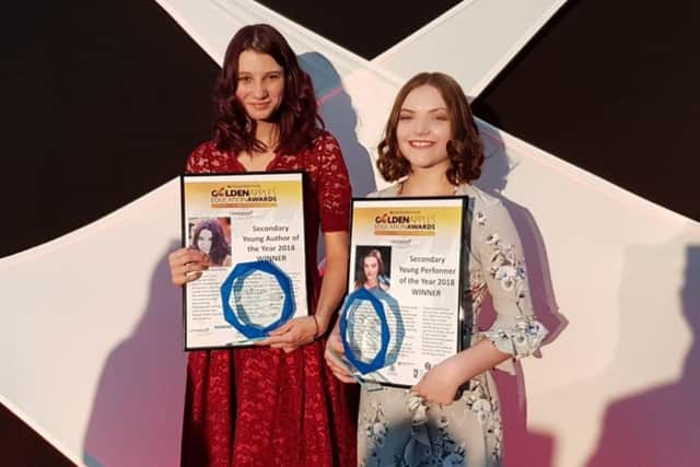 Chloe Chuck, left, and Rosy Smith with their awards