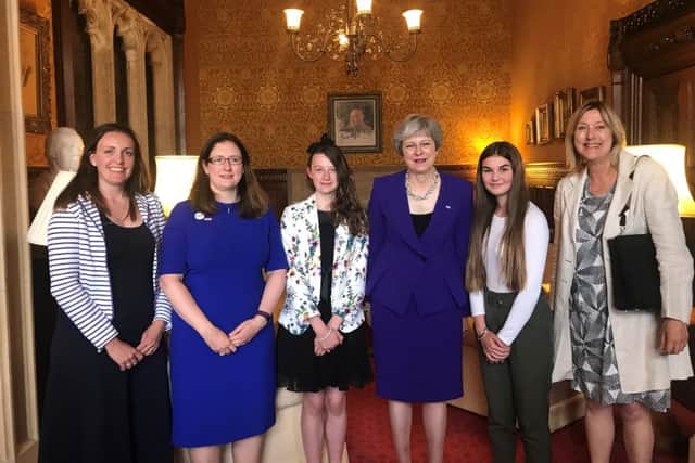 Nancy Threapleton  and Eleanor Taylor join MP Dr Caroline Johnson to meet Prime Minister Theresa May after a tour of Westminster. EMN-180907-170433001