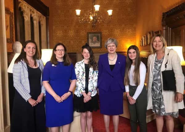 Nancy Threapleton  and Eleanor Taylor join MP Dr Caroline Johnson to meet Prime Minister Theresa May after a tour of Westminster. EMN-180907-170433001