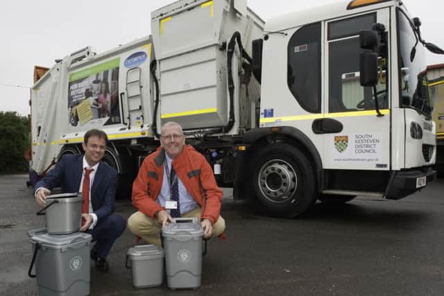 The SKDC Cabinet Member for Environment, Cllr Dr Peter Moseley (right), andLincolnshire County Councils Assistant Portfolio Holder for Commercial and EnvironmentalManagement, Councillor Daniel McNally, with the new food waste collection vehicle