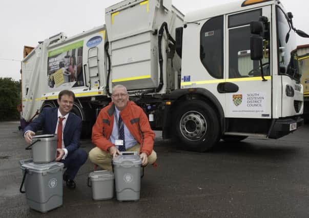 The SKDC Cabinet Member for Environment, Cllr Dr Peter Moseley (right), andLincolnshire County Councils Assistant Portfolio Holder for Commercial and EnvironmentalManagement, Councillor Daniel McNally, with the new food waste collection vehicle