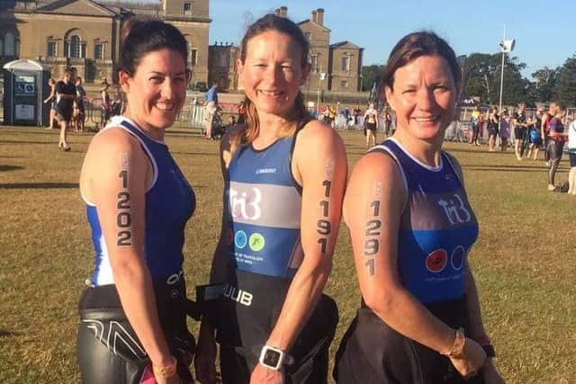 Ellie Pocock (middle) pictured with clubmates Jenny and Kerri, finished on the podium in Norfolk EMN-180507-090555002