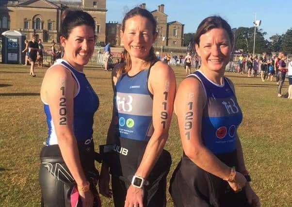 Ellie Pocock (middle) pictured with clubmates Jenny and Kerri, finished on the podium in Norfolk EMN-180507-090555002