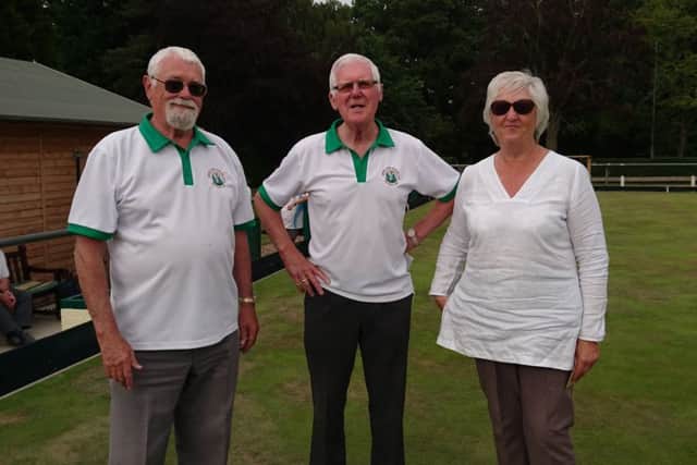 Runners-up were Pete and Angie Brown receive their prizes from Bernie Buck (centre).
