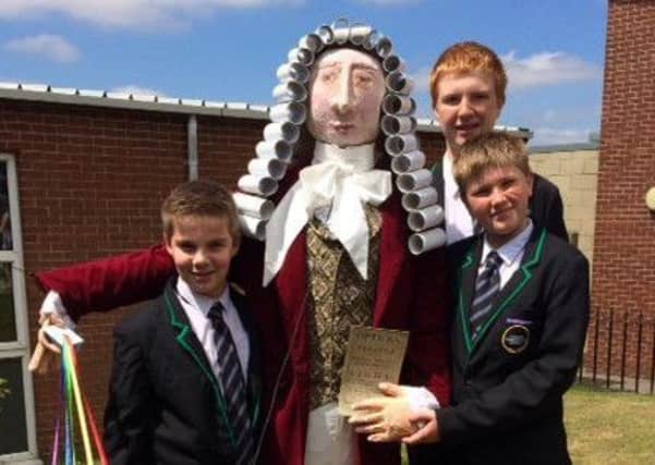 William Collins, Samuel Hughes and Jay Burns with Sir Isaac Newton