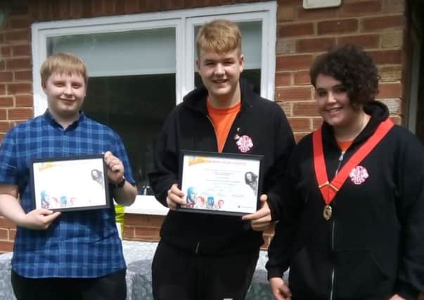 It was a poignant moment for are moving on due to reaching the Leo age limit. New President Amber presented Leo Luke and Leo Christopher 
with completion of service certificates and thanked them for all they had done for the club. EMN-181107-154602001