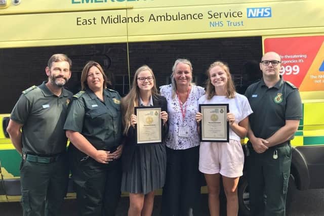 Jazz Davis and sister Katya with mum Vicky and members of EMAS EMN-181007-070654001