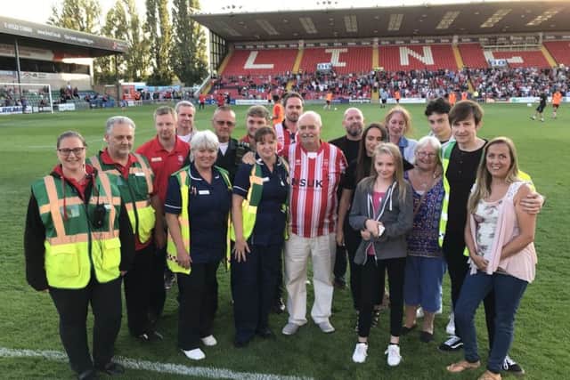 Michael Bull (centre) and his team of lifesavers EMN-180713-122447001