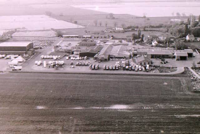 An aerial view of the poultry processing plant at Anwick and the car sales business opposite. EMN-180713-154103001