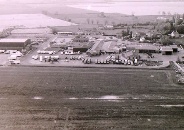 An aerial view of the poultry processing plant at Anwick and the car sales business opposite. EMN-180713-154103001