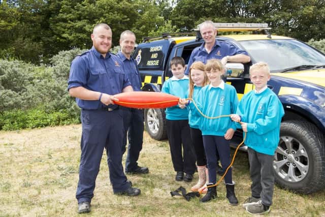 Theddlethorpe Academy.
Visit to Donna Nook where pupils looked around the RAF bombing range control tower, met with Coastguards and went onto the Lincolnshire Wildlife Trust area.
Pictured are Coastguards (l-r) Toby Merrikin, Chris Ashmore and Mick Horner with (l-r) Lewis Fyfe, Seraph Winters, Lottie Allam and Olly Tedford. All year 3.
Picture: Sean Spencer.
