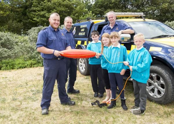 Theddlethorpe Academy.
Visit to Donna Nook where pupils looked around the RAF bombing range control tower, met with Coastguards and went onto the Lincolnshire Wildlife Trust area.
 
Pictured are Coastguards (l-r) Toby Merrikin, Chris Ashmore and Mick Horner with (l-r) Lewis Fyfe, Seraph Winters, Lottie Allam and Olly Tedford. All year 3.
Picture: Sean Spencer.