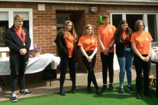 Five new members have joined the Leos - Cate, Em, Jack, Megan and Hannah are pictured with outgoing president Luke EMN-181107-154552001